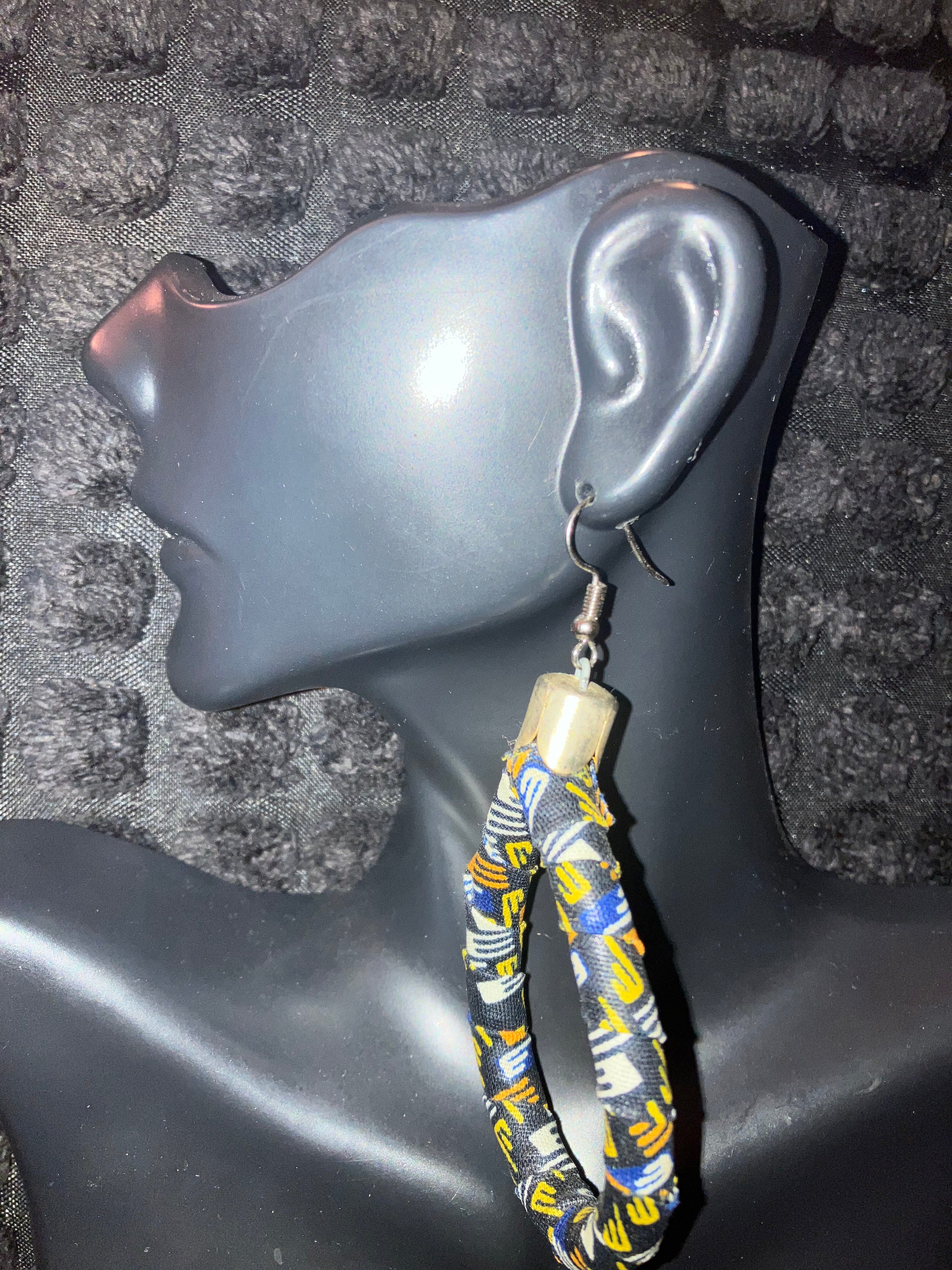 African Fabric Teardrops-multi (blk, white, yellow)